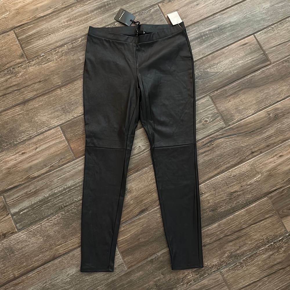 Black leather jeggings
